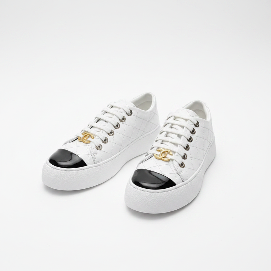 Chanel Quilted Calfskin Sneakers with Gold CC Charms – Size 37.5 (Pristine)